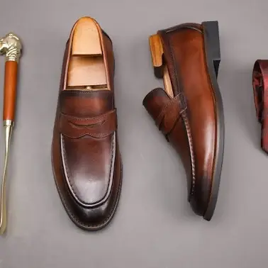 Luxury leather penny loafers flat lay